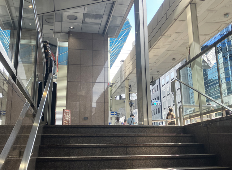 Go up the stairs.